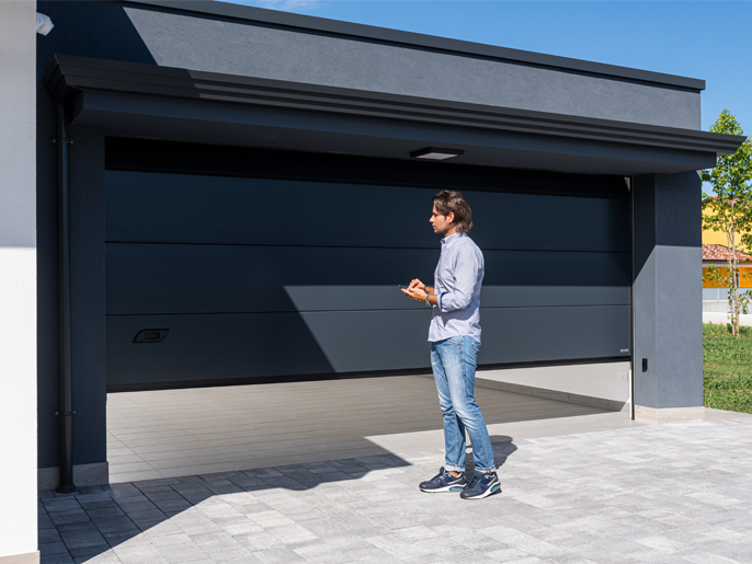 Комплект автоматики для секционных ворот высотой до 3,25 м на основе привода VER10DMS (встроенный блок управления, радиоуправление с фиксированным кодом, направляющий профиль)